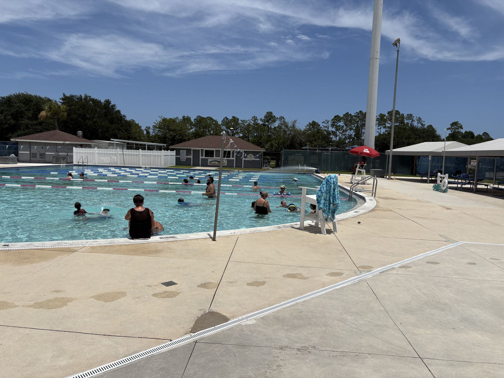 Belle Terre heated 25‑meter lap pool just 1 mile from the home.