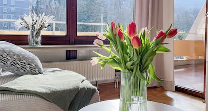 Quietly located, bright 2-room apartment with large loggia and underground garage