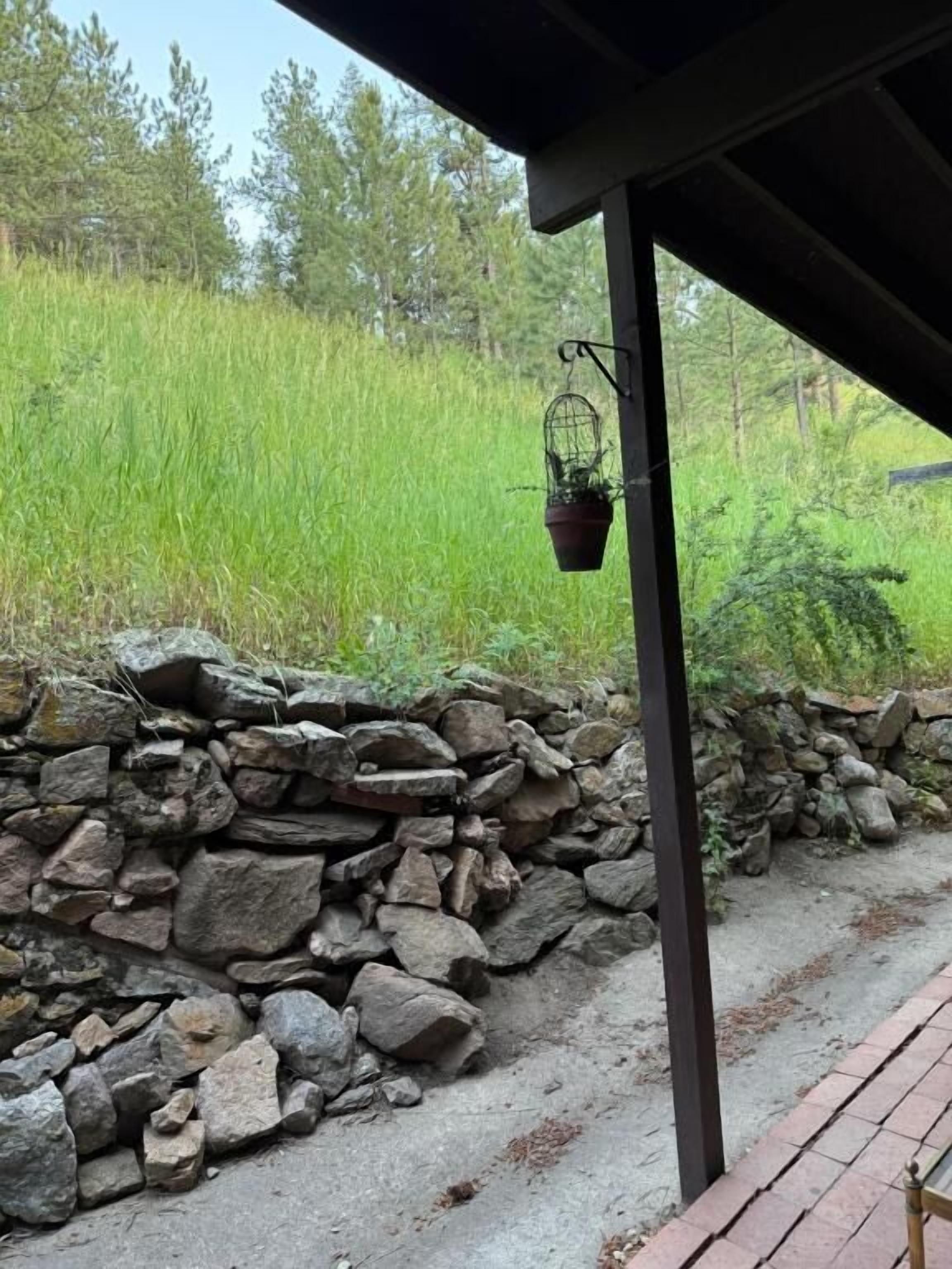 Habitación doble Deluxe, 1 cama Queen size, patio, vista a la montaña | Áreas de la propiedad