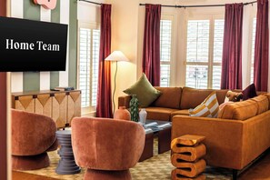 TV, fireplace, table football, offices - Upscale Escape • Pool, Hot Tub, Game Room, Firepit (San Antonio)