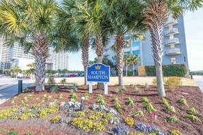 A sign for 'South Hampton' with a landscaped garden in front. - South Hampton 3BR Oceanview,Balcony,Steps to Beach (Myrtle Beach)