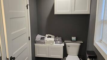 Hair dryer, bidet, towels, soap