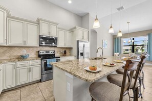 Fridge, microwave, oven, stovetop - Canalfront Island Escape with Pool, Lanai & Dock - Antigua Villa - Roelens (Cape Coral)