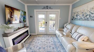 Smart TV, fireplace, books