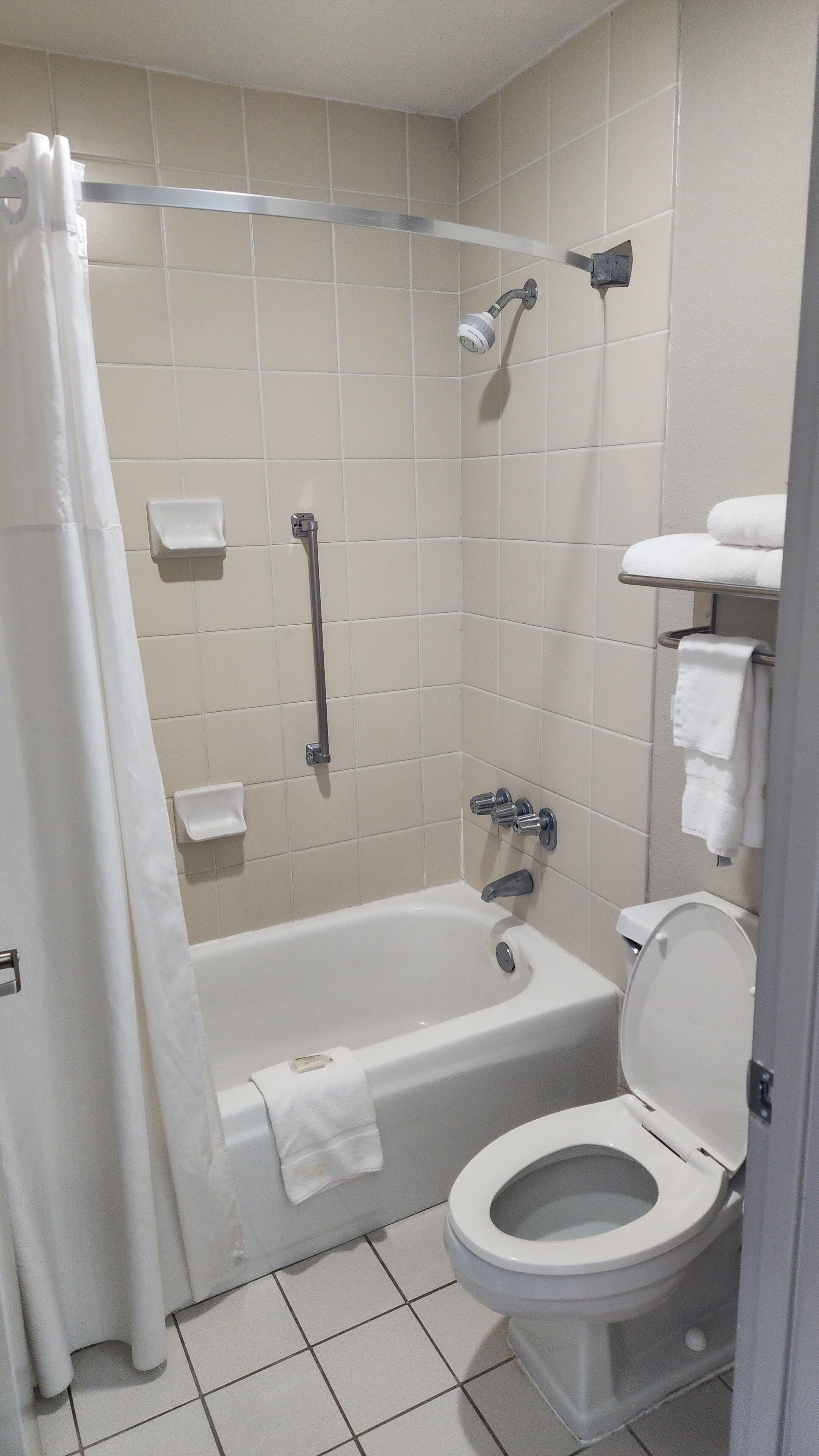 Hair dryer, towels, soap, toilet paper