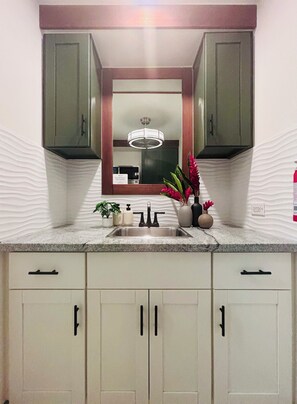 Fridge, microwave, stovetop, coffee/tea maker