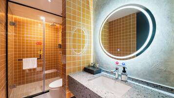 Signature Twin Room | Bathroom | Shower, hair dryer, slippers, towels