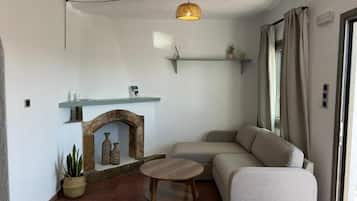 Familienapartment, Balkon, Gartenblick | Wohnbereich