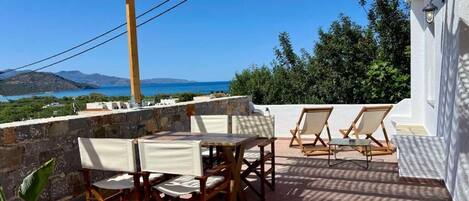 Family Apartment, Balcony, Garden View | Outdoor dining