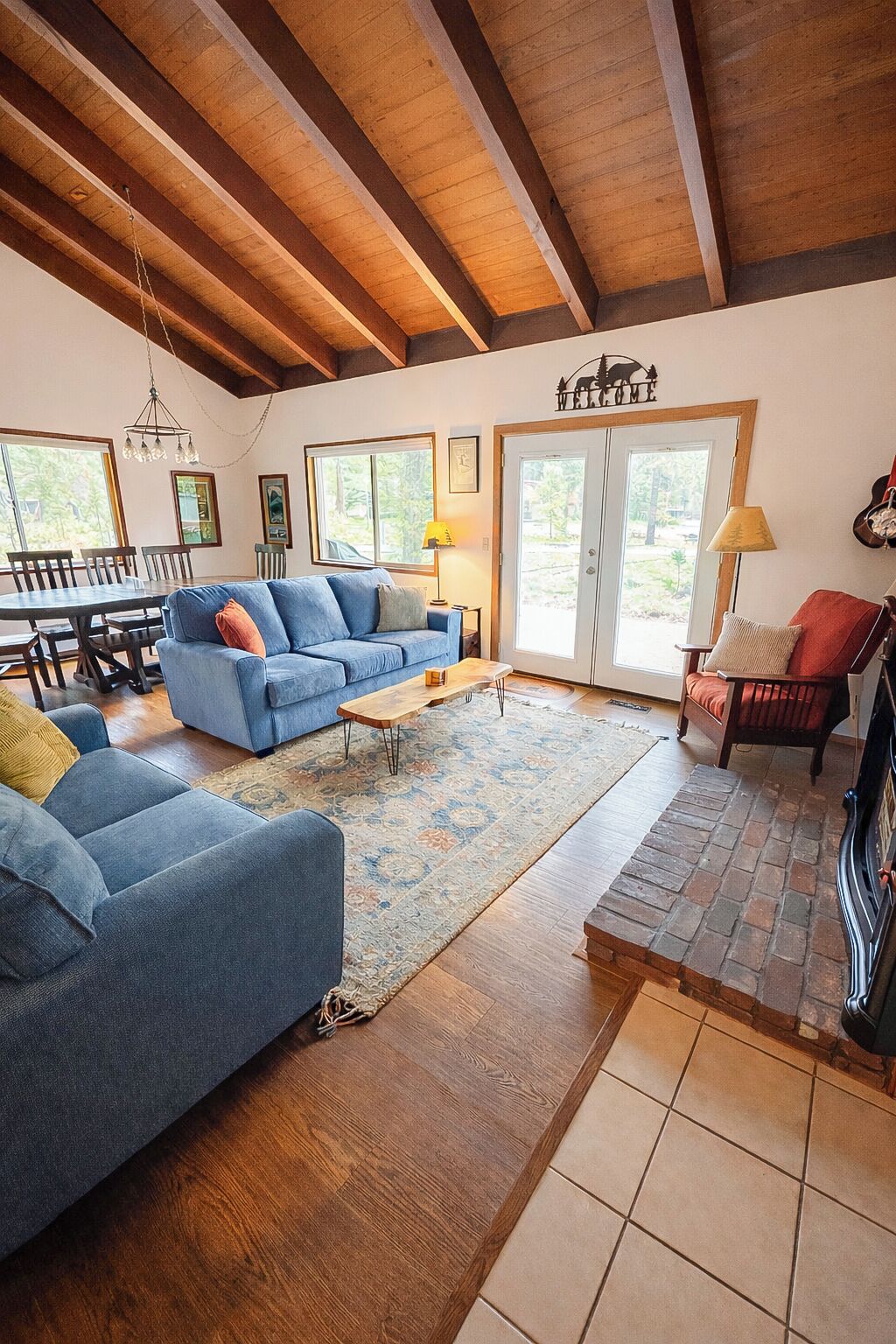 Smart TV, fireplace, books, computer monitors