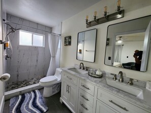 Hair dryer, towels, soap, shampoo