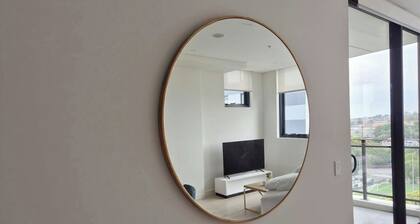 Modern 1BR + Study | 5 Min to Train | Free Parking