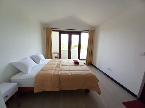 Rumah WJ Room and Suites