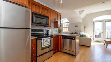 Fridge, coffee/tea maker, cookware/dishes/utensils