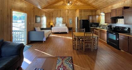 Vaulted-Ceiling Cabin for 4 with King Bed + Bunks, Full Kitchen & Pond Views