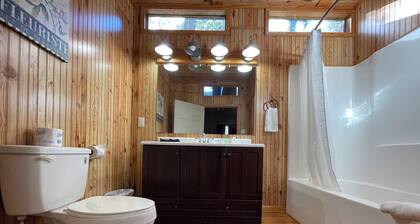 Spacious 1-Bedroom Cabin with Full Kitchen, Vaulted Ceiling & Outdoor Space