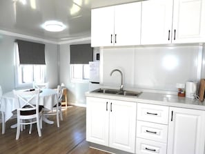 Family Cabin | Private kitchen | Fridge, microwave - Country Style Holiday Park (Glen Aplin)