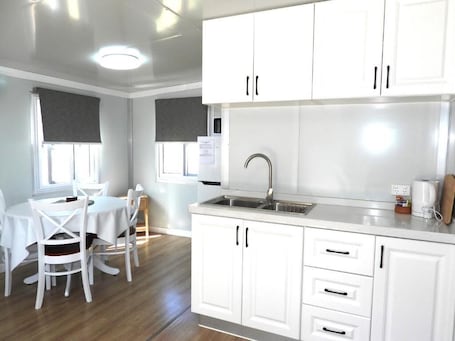 Family Cabin | Private kitchen | Shared fridge, microwave. Country Style Holiday Park