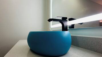 Comfort Room, 1 King Bed, Private Bathroom | Bathroom | Shower, towels, soap, shampoo