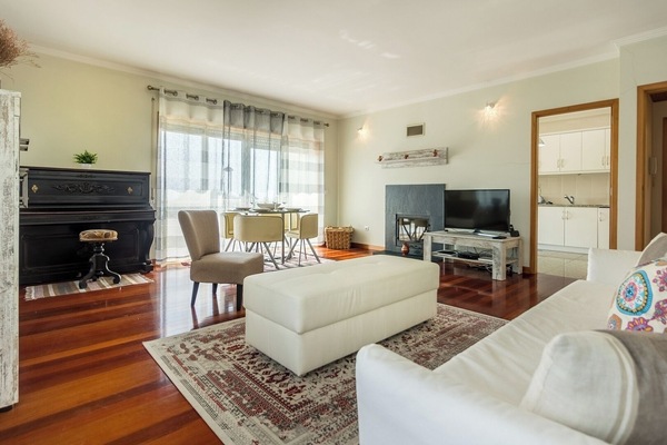Living Room with Dining Table and Sofa-Bed