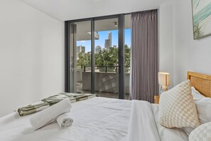 Iron/ironing board, WiFi, bed sheets - Chic 1BR Beachside Apartment in GC w/ Pool & Gym (Surfers Paradise)