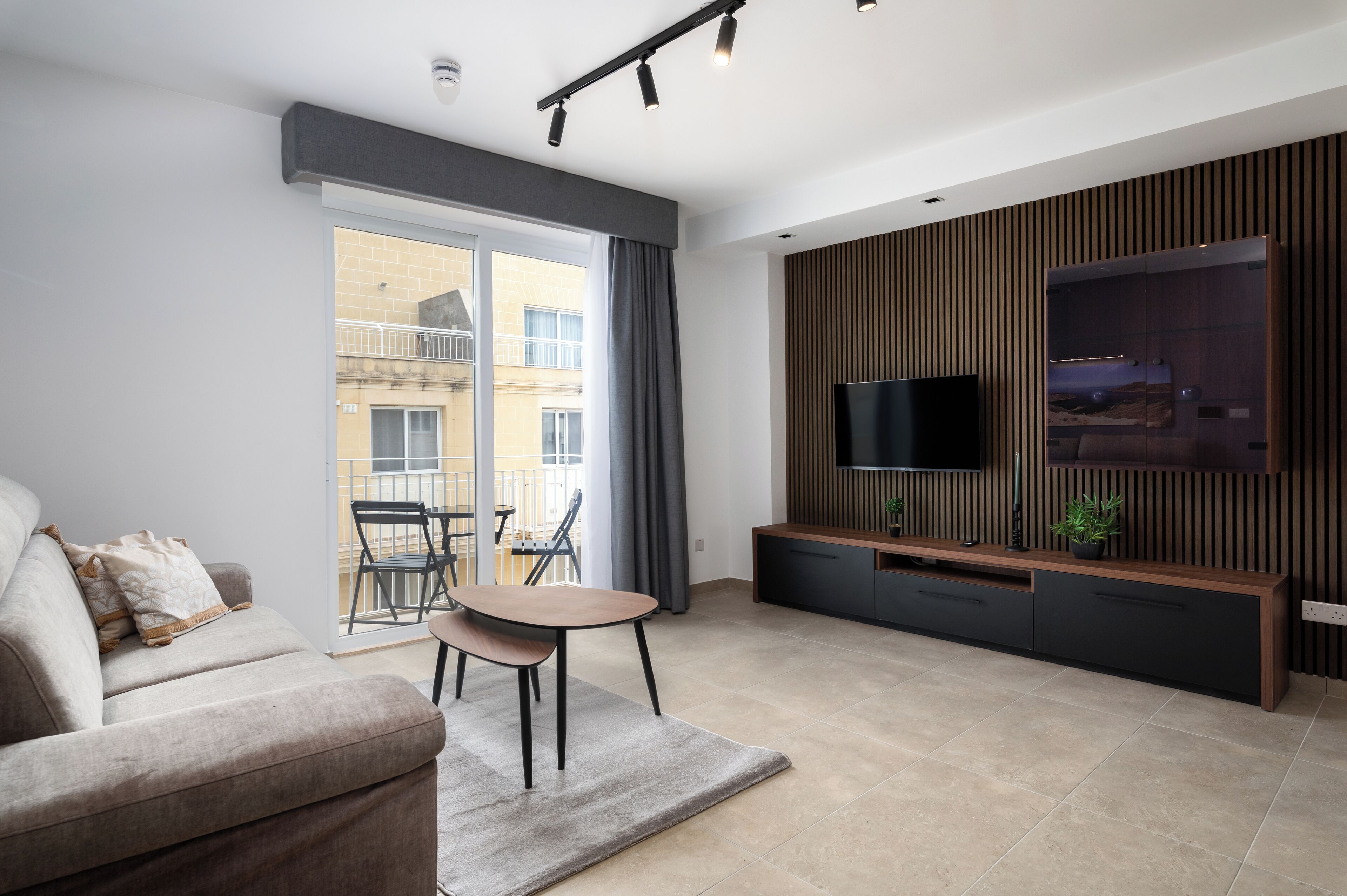 Penthouse, uitzicht op de stad | Woonruimte | Flatscreentelevisie