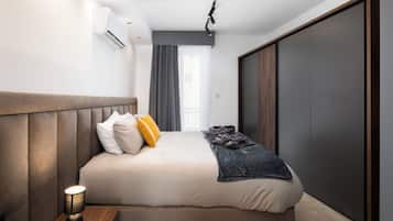 Cobertura, vista para a cidade | Cortinas blackout, ferros/tábuas de passar roupa, Wi-Fi de cortesia