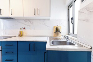 Attico, vista città | Cucina privata