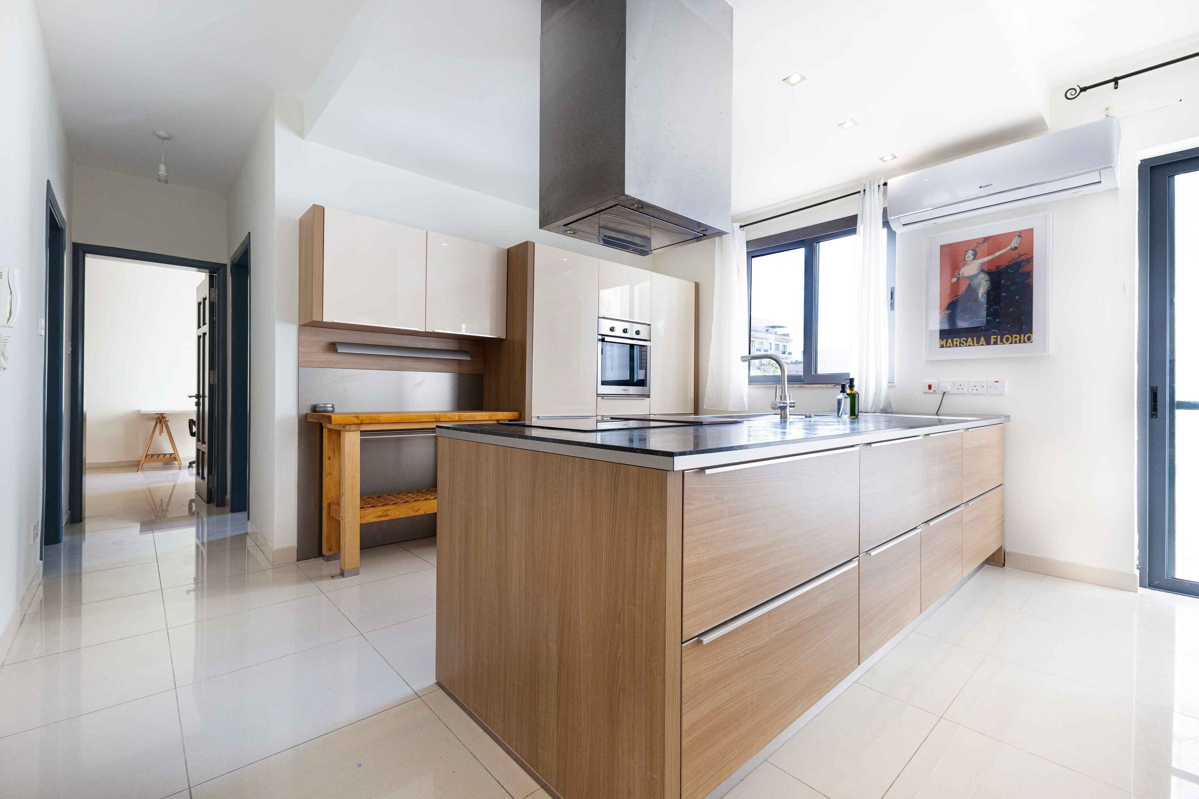 Departamento, vista a la ciudad | Cocina privada