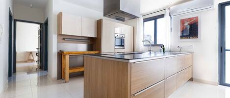 Departamento, vista a la ciudad | Cocina privada