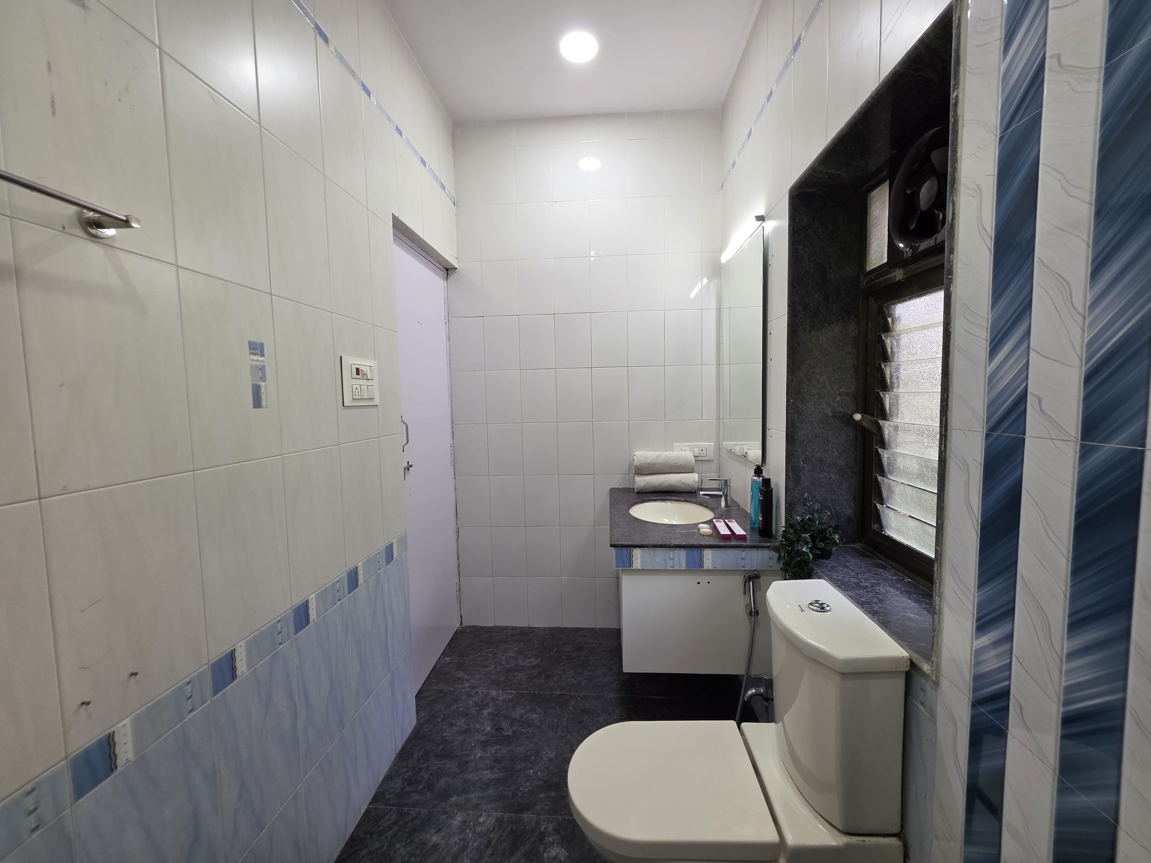 Shower, towels, soap, shampoo