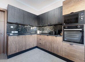 Cobertura, vista para a cidade | Cozinha privada