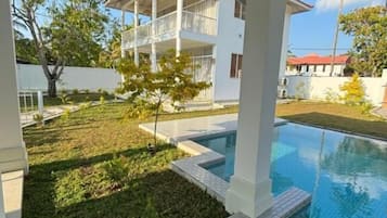 Outdoor pool, open 8:00 AM to 10:00 PM, pool umbrellas, pool loungers