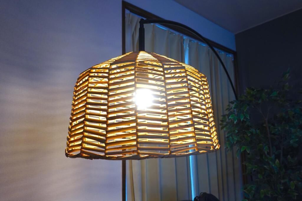 A hanging light fixture with a geometric pattern.