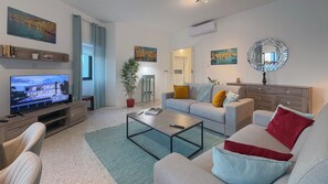 Apartamento, vista para o jardim | Área de estar