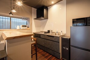 Comfort House, Balcony, Garden View | Private kitchen | Full-size fridge, microwave, oven, electric kettle - Beppu Takekaze (Beppu)