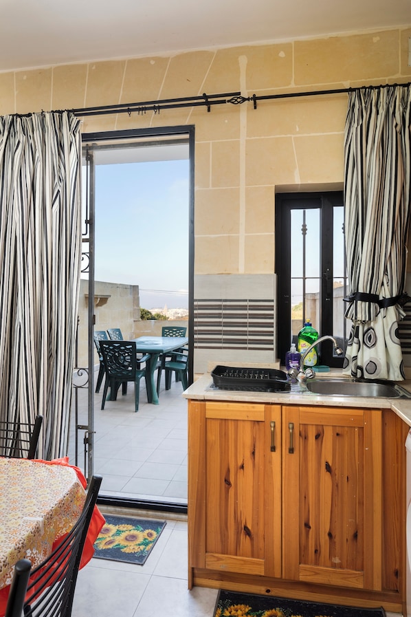 Departamento, vista a la ciudad | Cocina privada