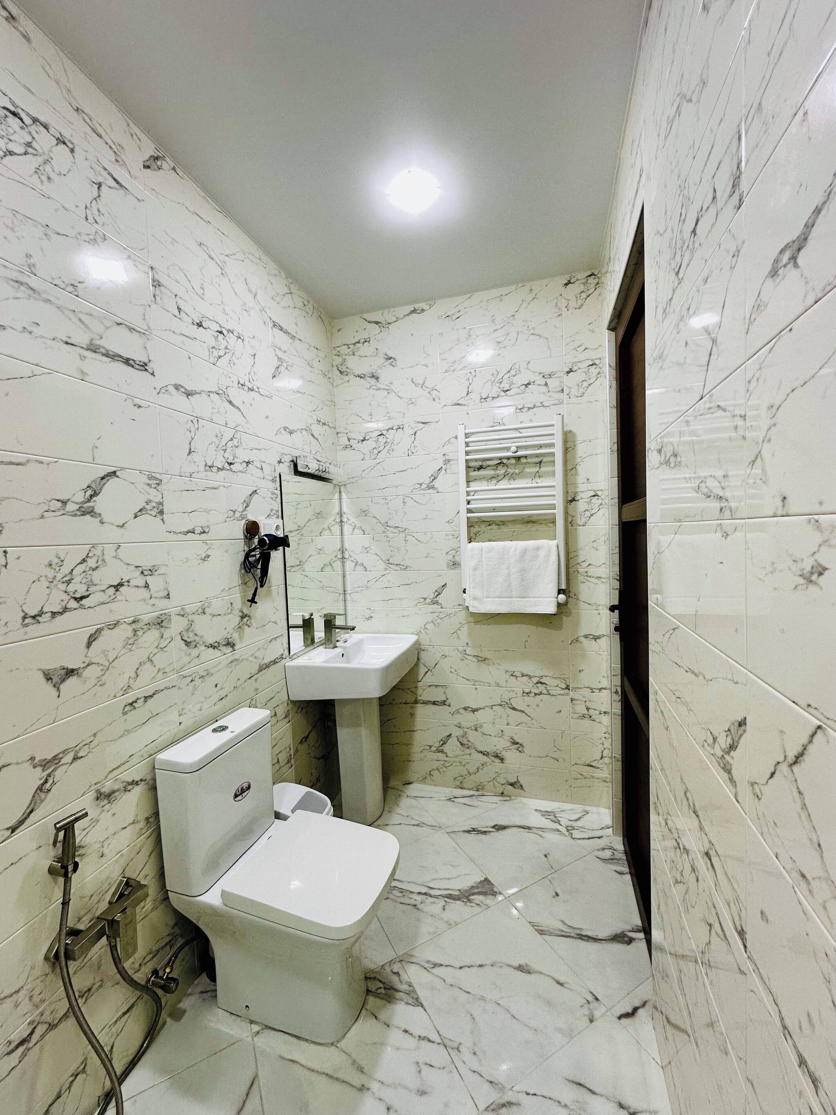 Family Quadruple Room, Balcony, City View | Bathroom | Shower, hair dryer, towels, soap