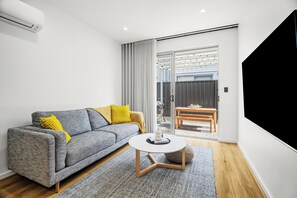 Living area - Relax by the Beach, Close to Everything - Minutes from City & Airport! (Flinders Park)