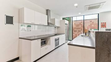 Fridge, microwave, stovetop, cookware/dishes/utensils