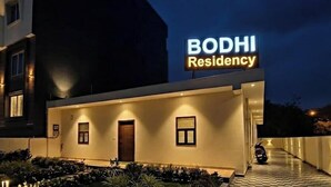 A modern building with a sign reading 'BODHI Residency.' - Bodhi Residency (Greater Noida)