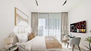 Ein modernes Hotelzimmer mit einem großen Bett, einem Schreibtisch, einem Stuhl und einem Fernseher.