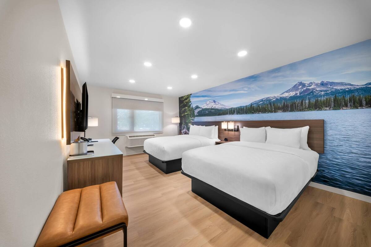 Standard Room, 2 Queen Beds, Non Smoking | Desk, blackout drapes, iron/ironing board, WiFi (free)