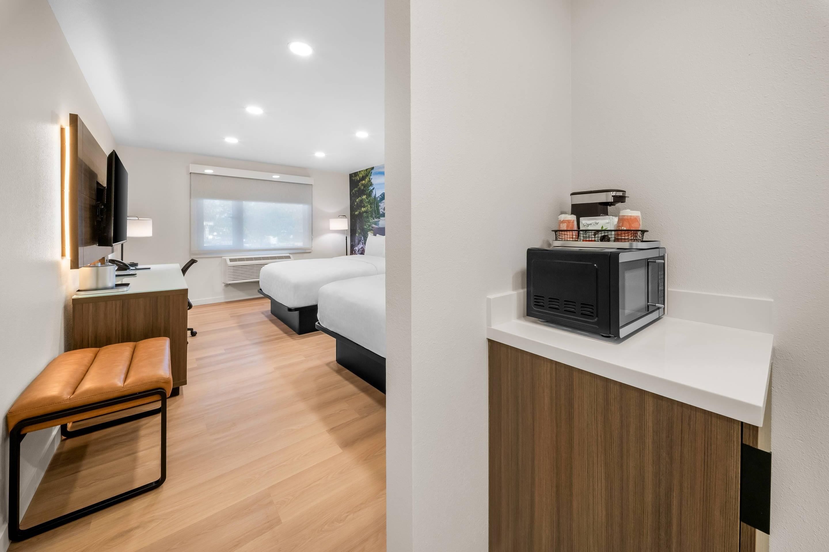 Standard Room, 2 Queen Beds, Non Smoking | Desk, blackout drapes, iron/ironing board, WiFi (free)