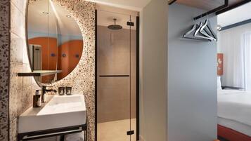 Shower, rainfall showerhead, hair dryer, towels