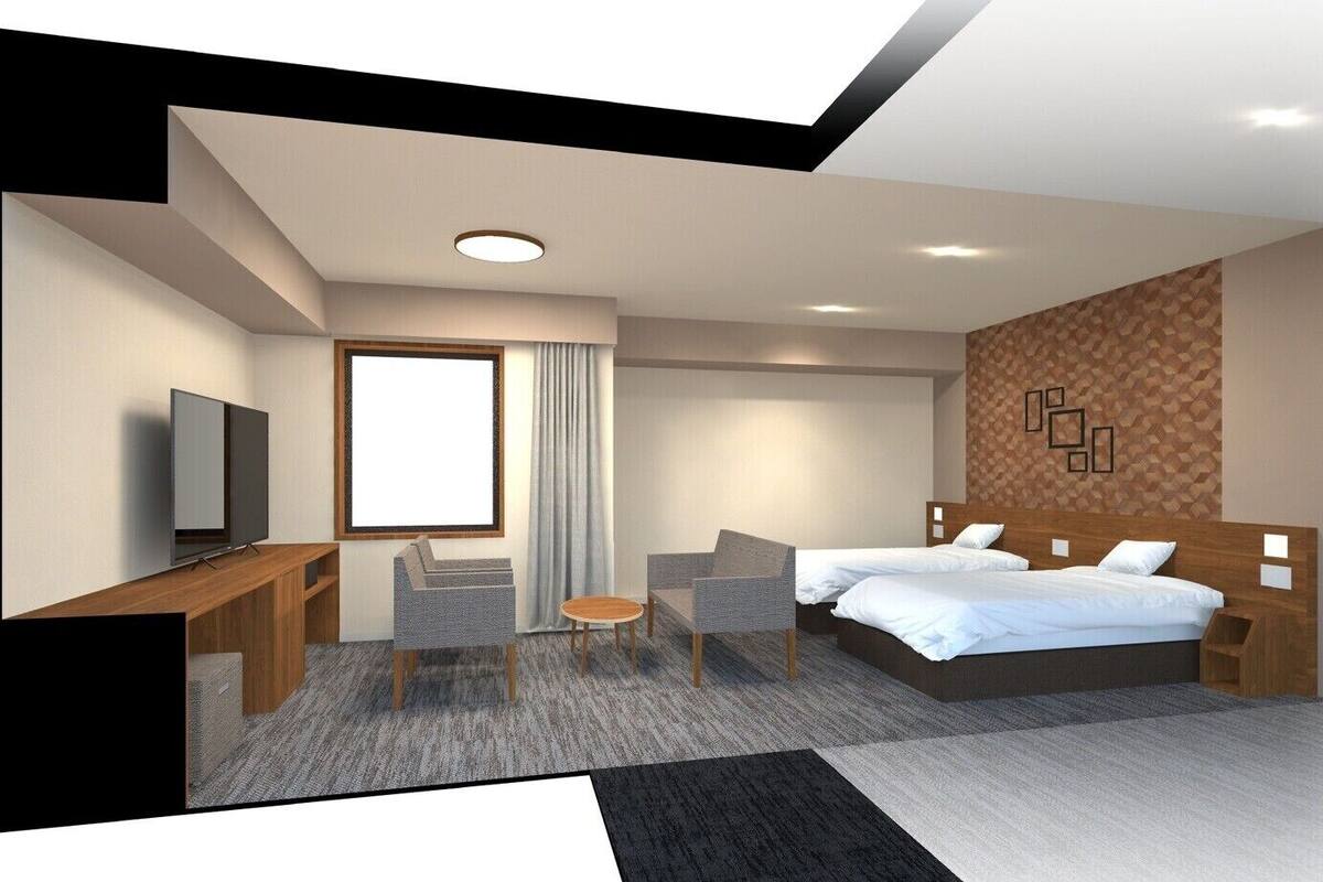 Una habitación de hotel moderna con cama, escritorio, televisor y zona de estar.