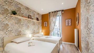 3 bedrooms, desk, iron/ironing board, travel cot