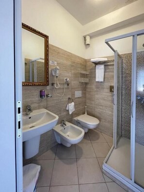 Deluxe Double Room, Balcony | Bathroom | Shower, hair dryer, towels, soap