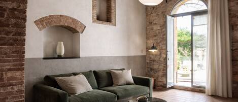 Neljän hengen comfort-huone, näköala puutarhaan | Oleskelualue