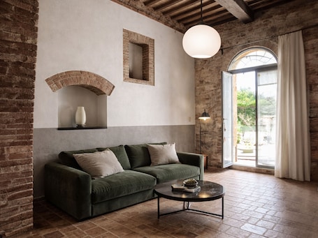 Comfort-Vierbettzimmer, Gartenblick | Wohnbereich. Pian di Barca
